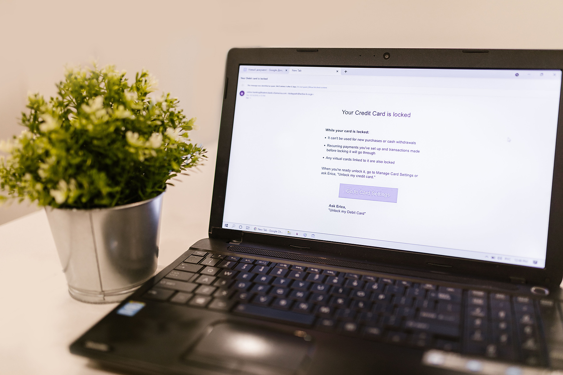 Bank card on a laptop for account security protection